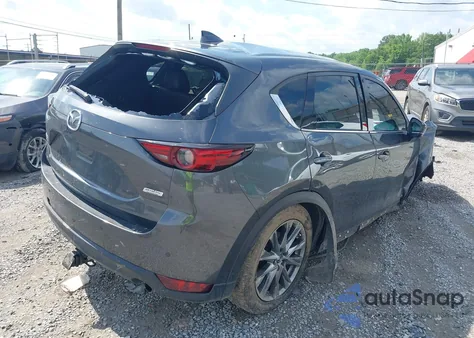 2019 Mazda Cx-5 Signature z USA, uszkodzony, nr VIN JM3KFBEY3K0630493